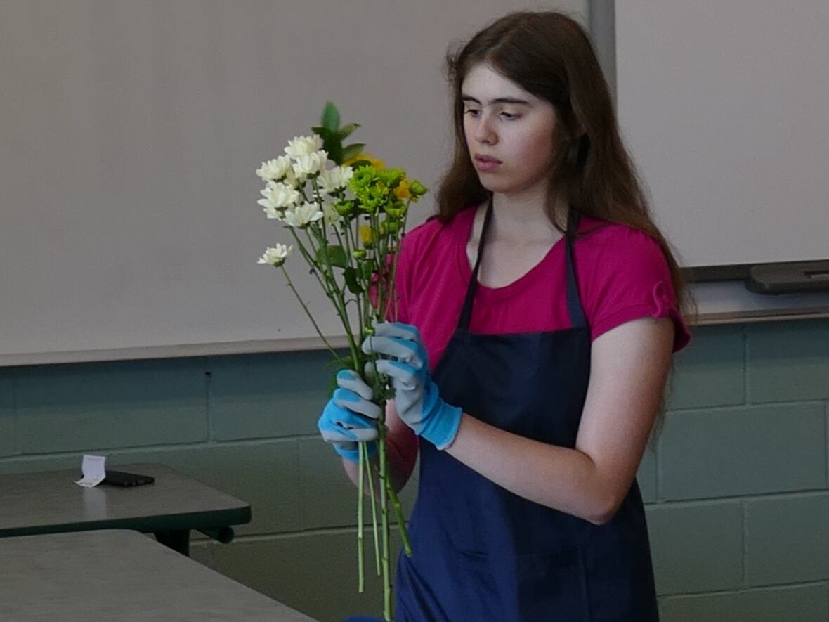 confidence blooms thanks to flower shop program for students with