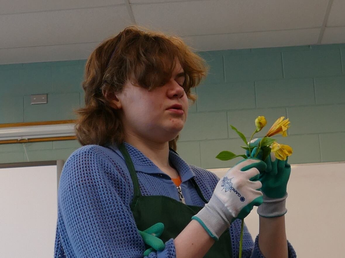 confidence blooms thanks to flower shop program for students with