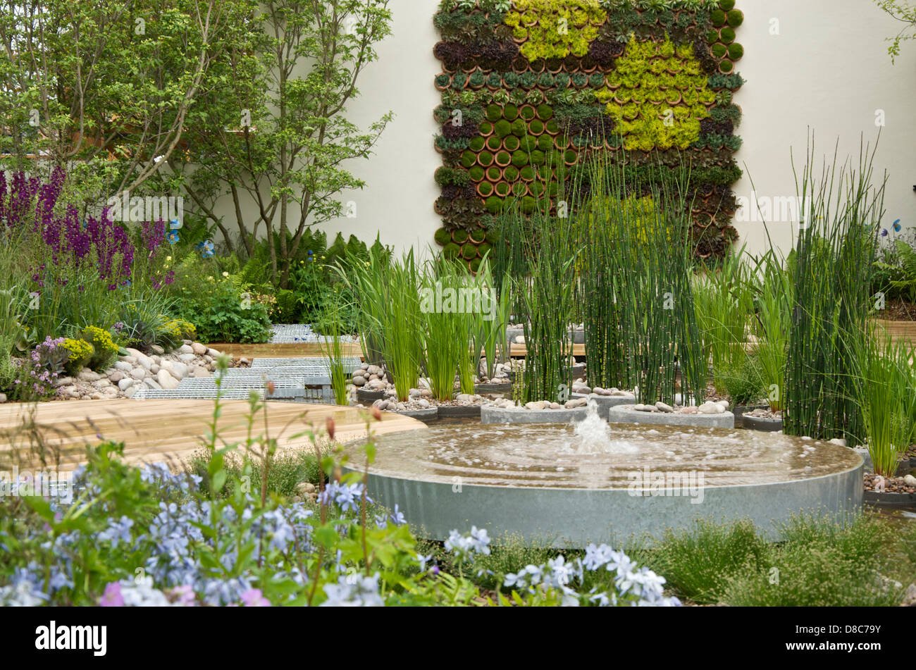 the fountain and living wall in the rbc blue water roof garden at