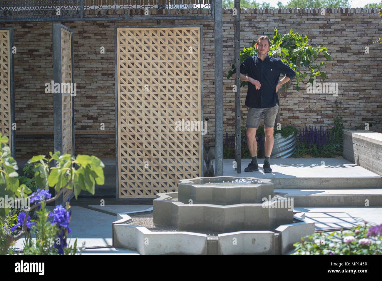 designer tom massey in the lemon tree trust show garden as