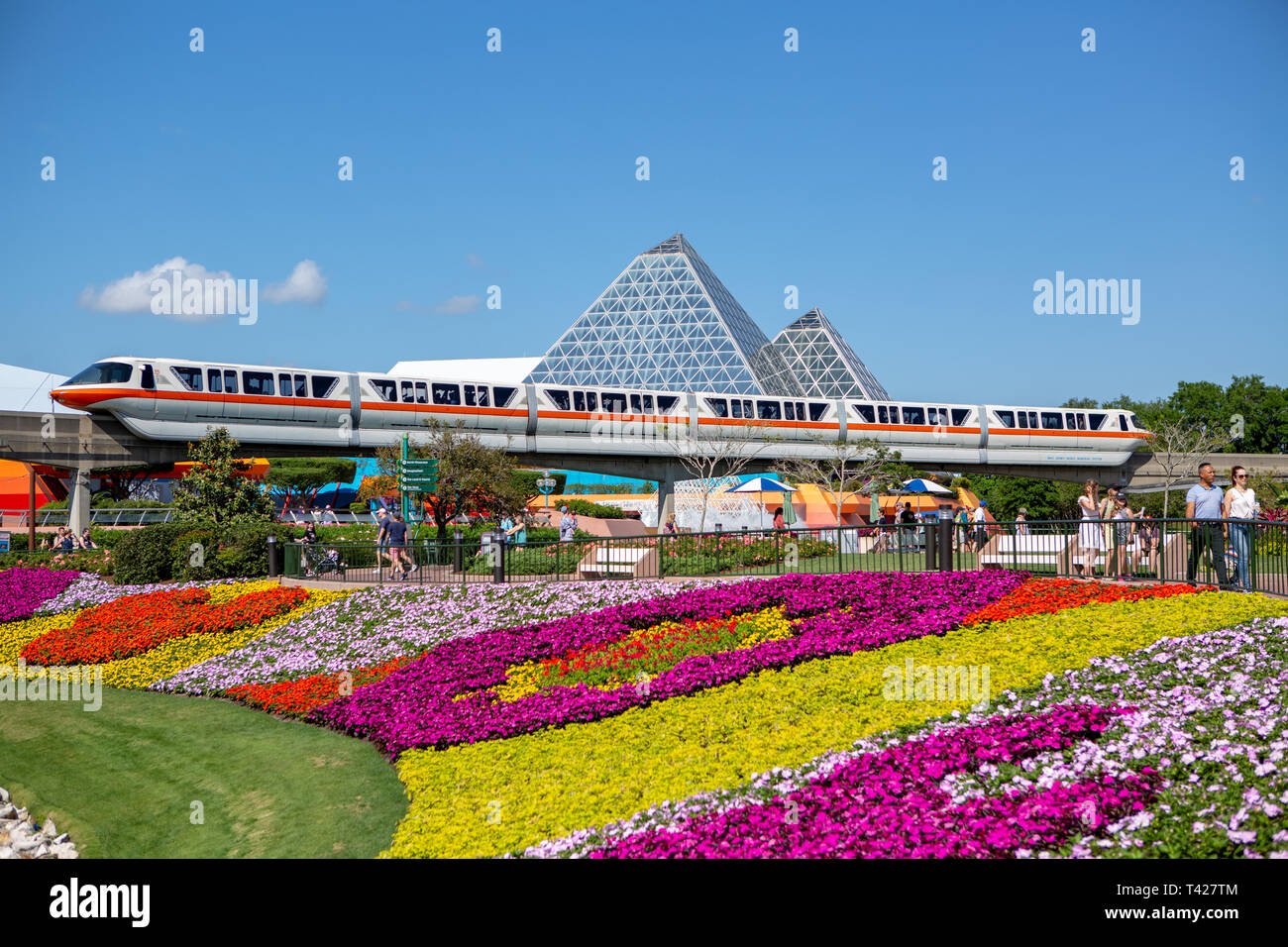 monorail passes in front of journey into your imagination amid
