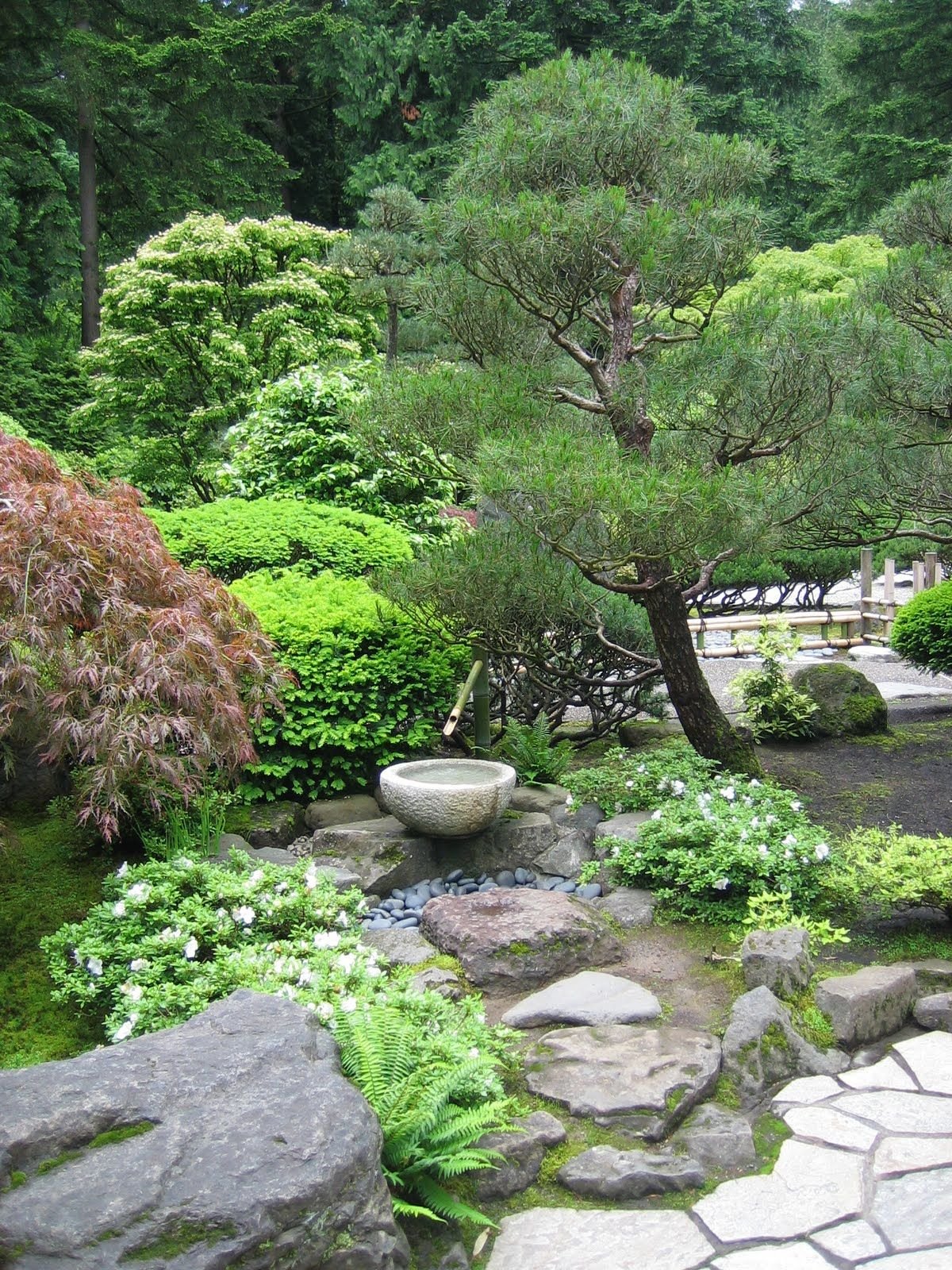 small oriental gardens | small stone fountain in the flat