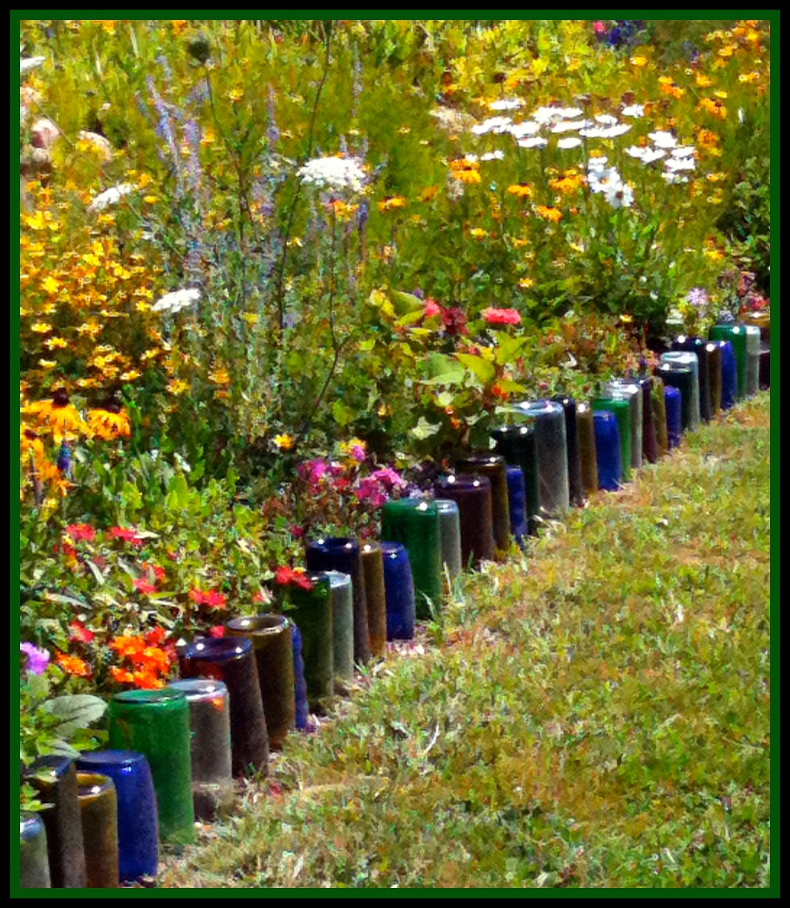 upcycle glass bottles into a garden border - natural green mom