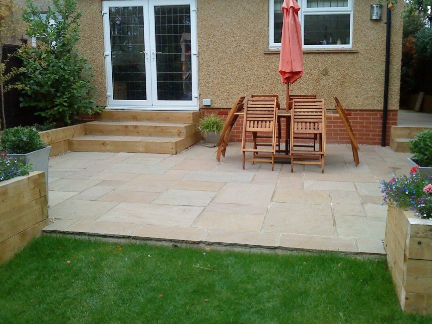 natural stone patio, raised beds, summer house: a complete garden