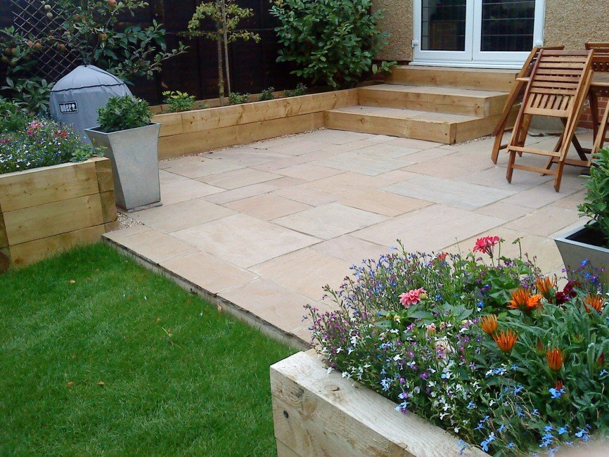natural stone patio, raised beds, summer house: a complete garden