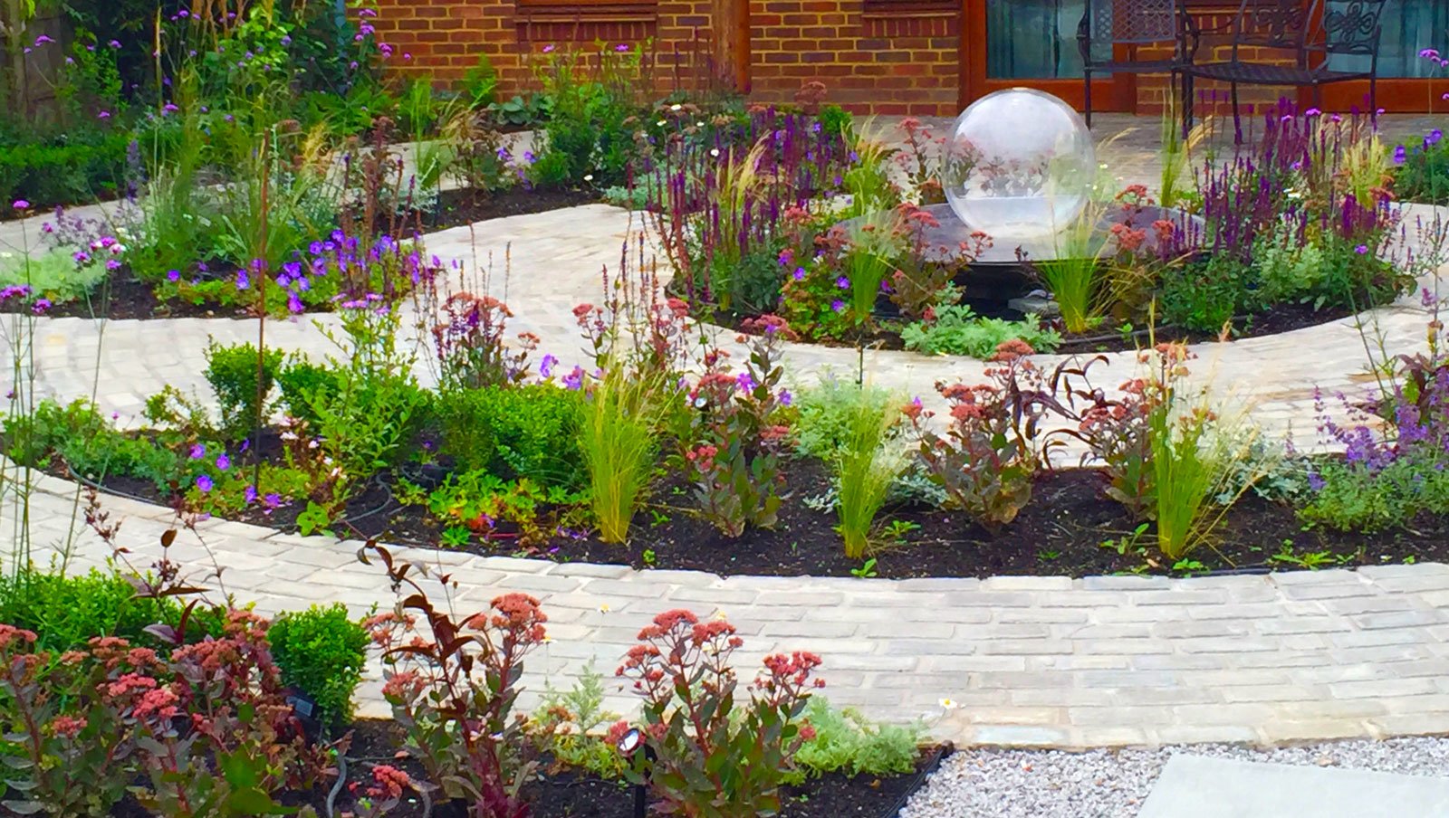 designs for all seasons hospice garden - allison armour sphere fountain